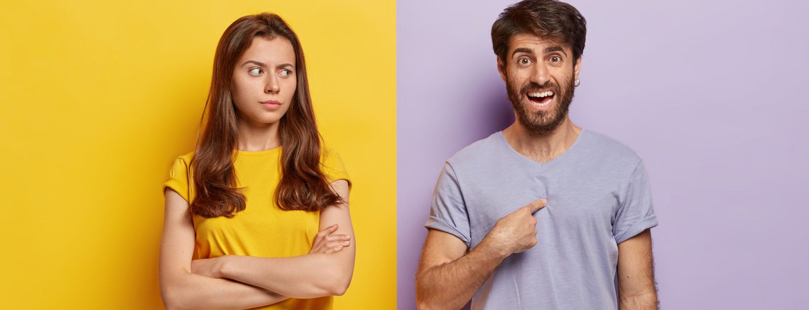 Studio shot of pleased smiling millennial man points at himself, asks why him, angry sad woman keeps arms folded, looks in dissatisfaction at boyfriend, suspects in something. People, emotions concept